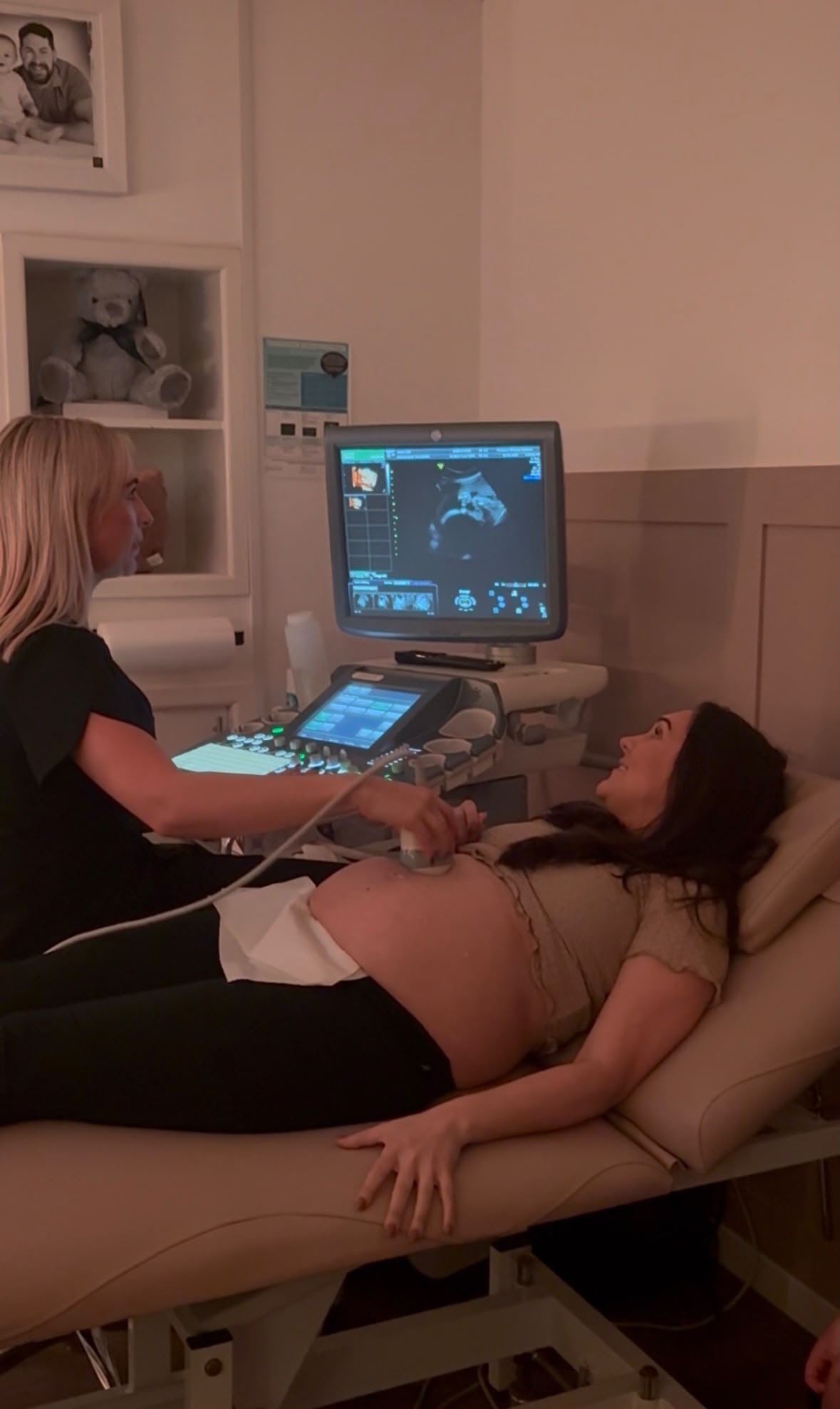 A sonographer carrying out a baby scan for an expectant mum at Precious Glimpse